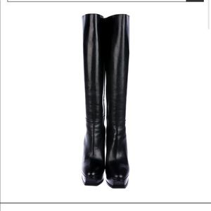 Saint Laurent Knee High Boot w/platform, semi pointed, and concealed zipper.